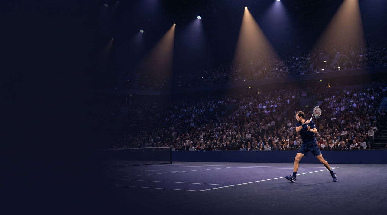 La Defense Arena indoor at the Paris Rolex Masters during an evening session, dark indoor purple-blue hard court glowing under theatrical spotlight cones from above, vast modern arena interior receding into shadow with deep navy and indigo atmosphere